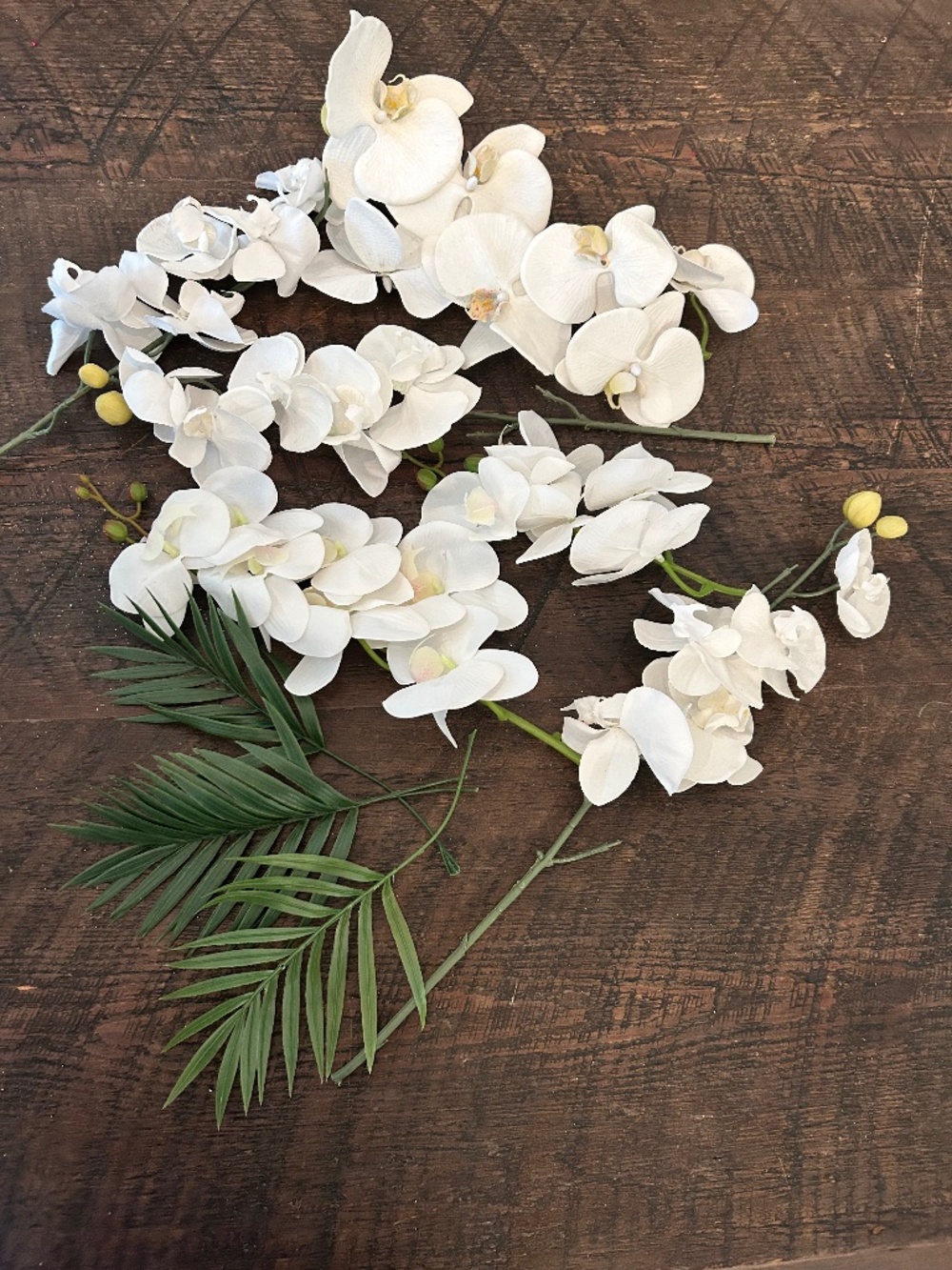 Six Stems of White Silk Orchids and Palm Fronds.
